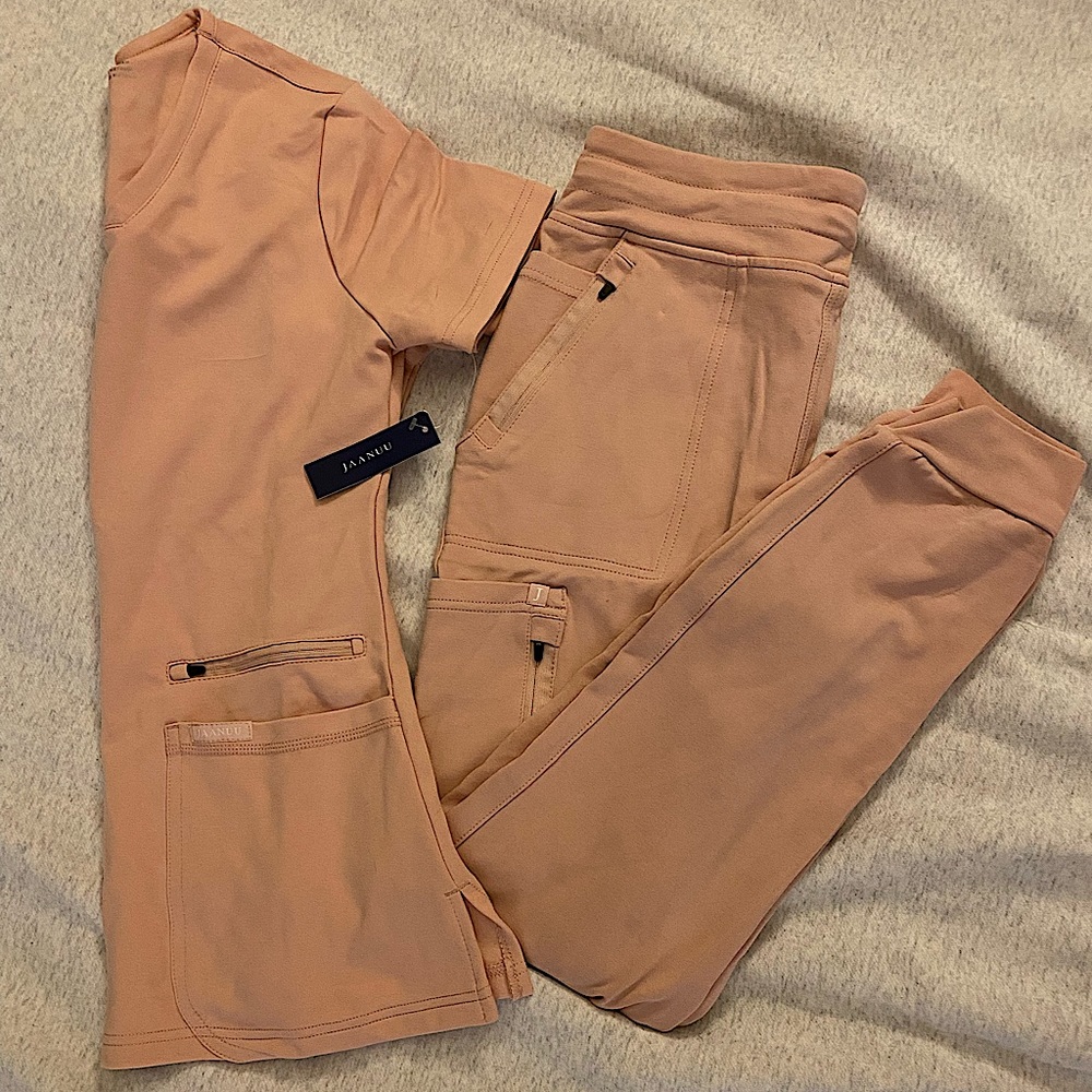Jaanuu light pink scrub set. Size medium regular joggers and size small top